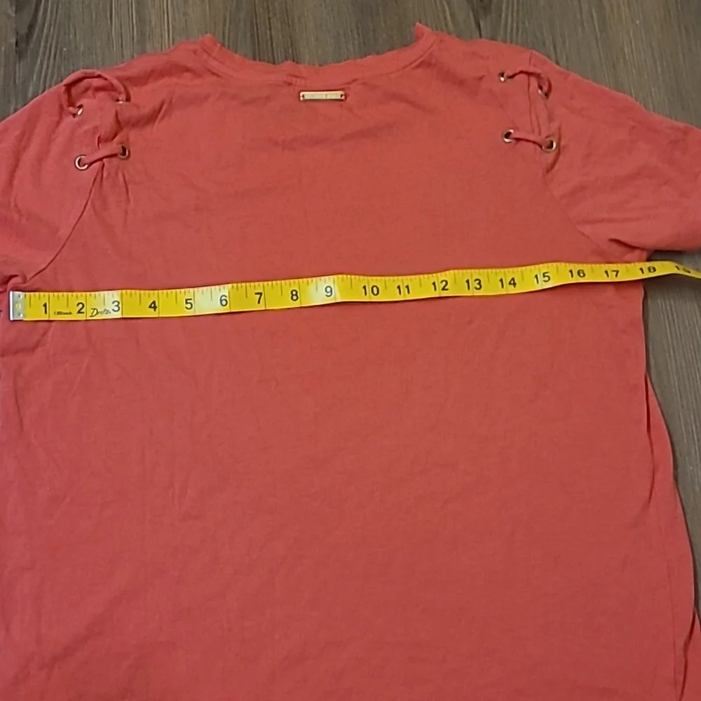 Michael Kors Orange Short Sleeve Top with Lace-Up Detail used good condition‎
